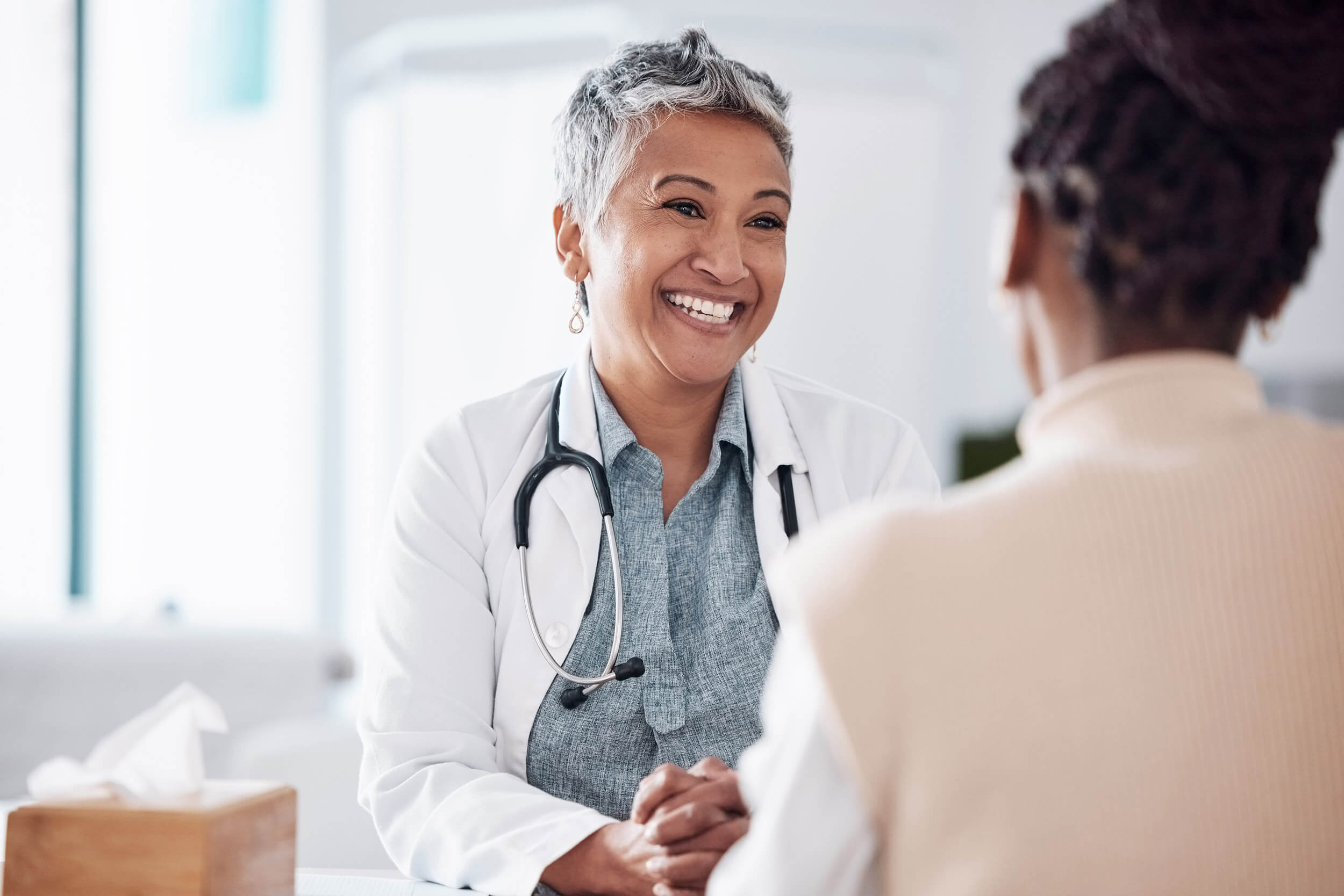 A doctor talking to a patient